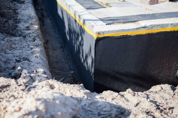 Professional Wet Basement Repair technician working in Carrollton, OH